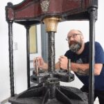 Neil Burton with donated press